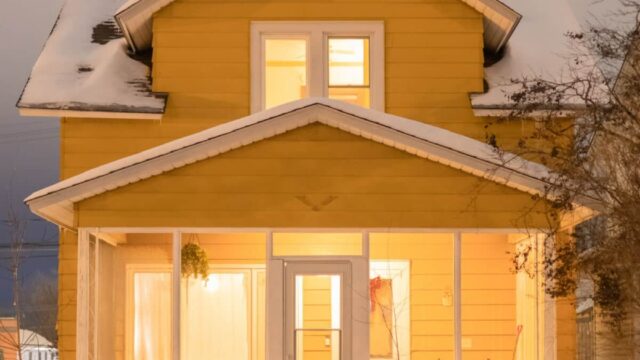 A winter picture of the exterior of Ely Camp Haus.