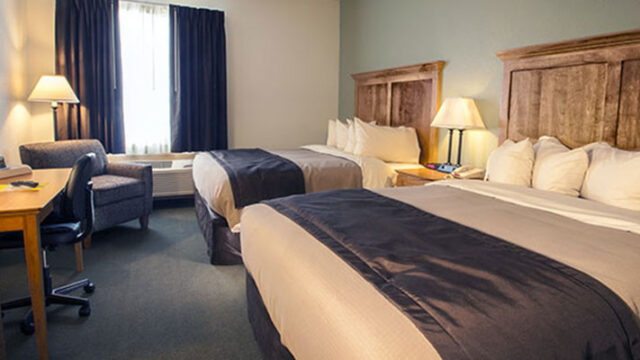 A view of a double queen bed room at the Junction Inn.