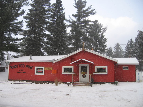An outside view of the Knotted Pine Inn during the winter.