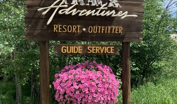 The welcome sign for Moose Track Adventures.