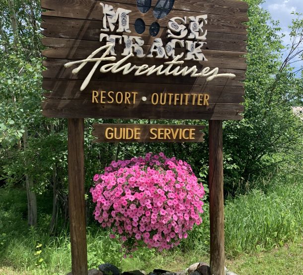 The welcome sign for Moose Track Adventures.
