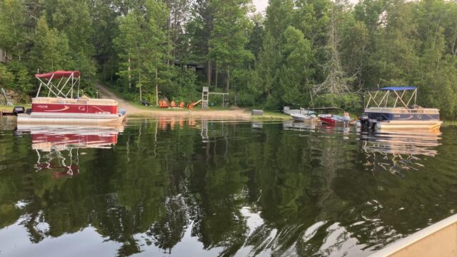 A view of the shoreline at Northwinds Lodge from a canoe.