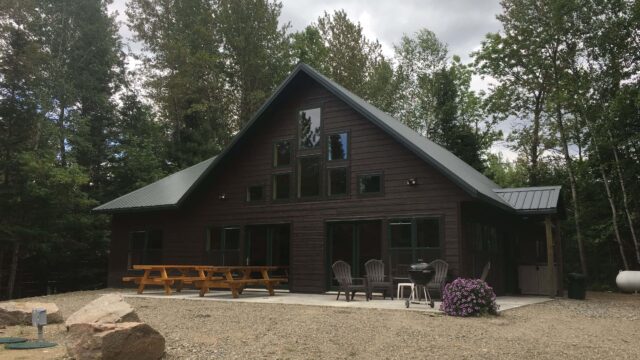 The outside view of one of the lake homes at Moose Track Adventures.