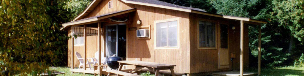 The outside view of one of the cabins at Shagawa Inn Resort.