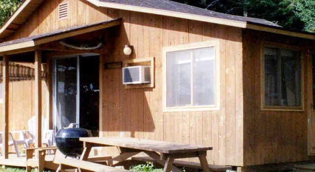 The outside view of one of the cabins at Shagawa Inn Resort.